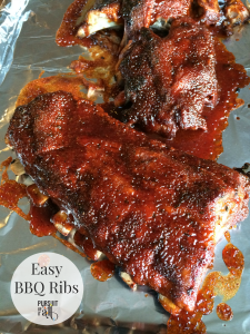 Easy BBQ Ribs: they start in the slow cooker and finish under the broiler. Fall off the bone tender!